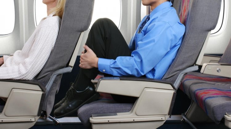 Tall Passengers: Who Should Pay for the Extra Legroom?